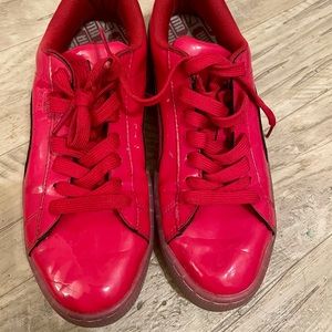 Red Patent Puma sneakers